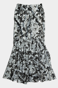Long skirt in black and white with elastic waist and ruffle ending image 0