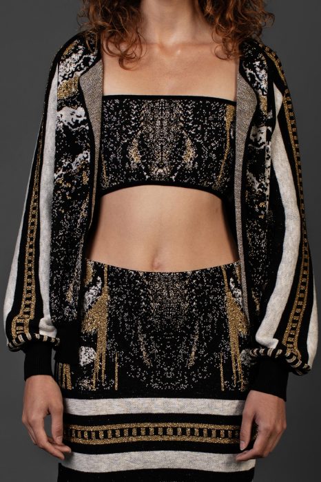Gold jacquard knitted cardigan with black trimming